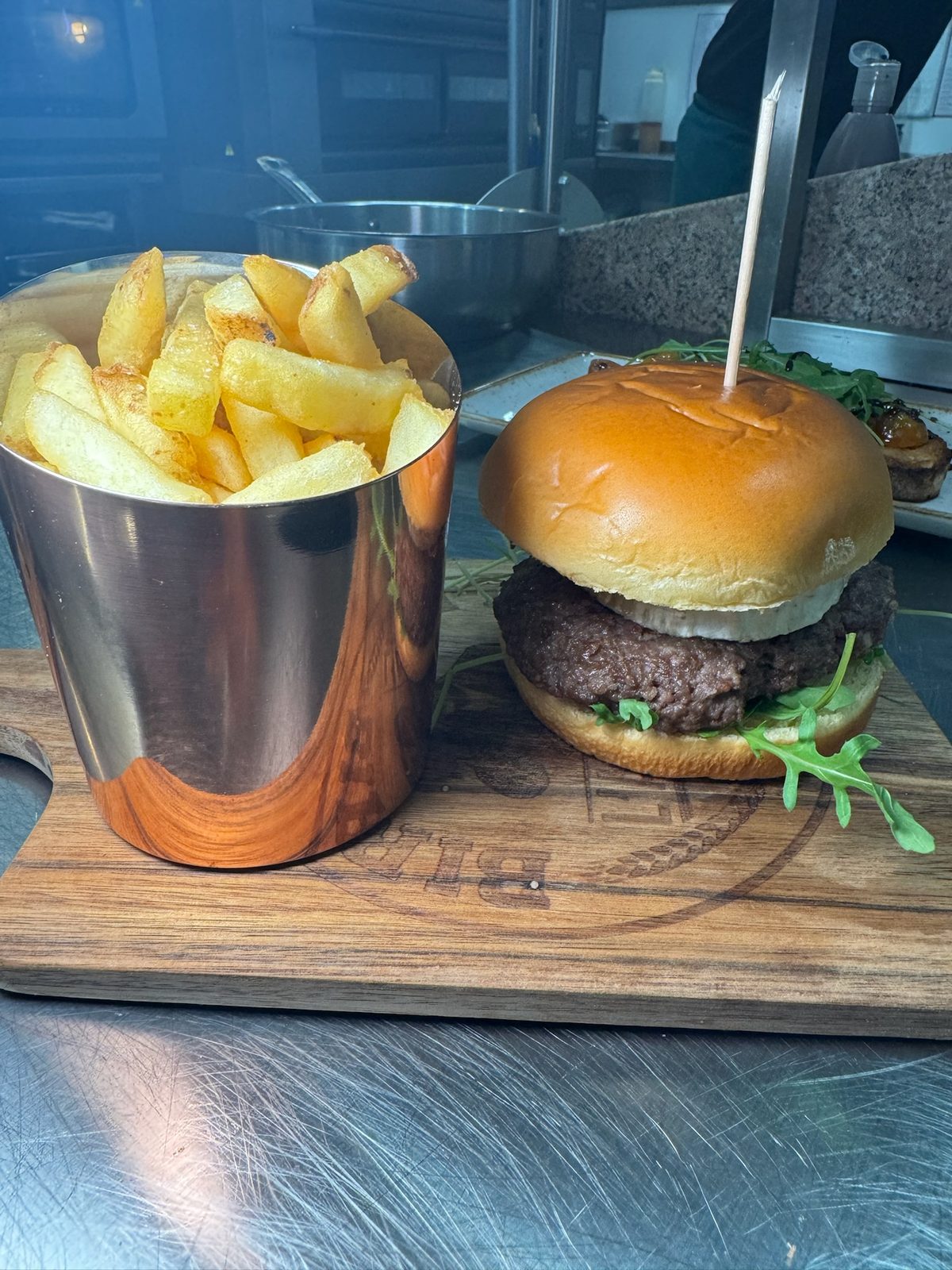 Burger and chips at Deli's Kitchen