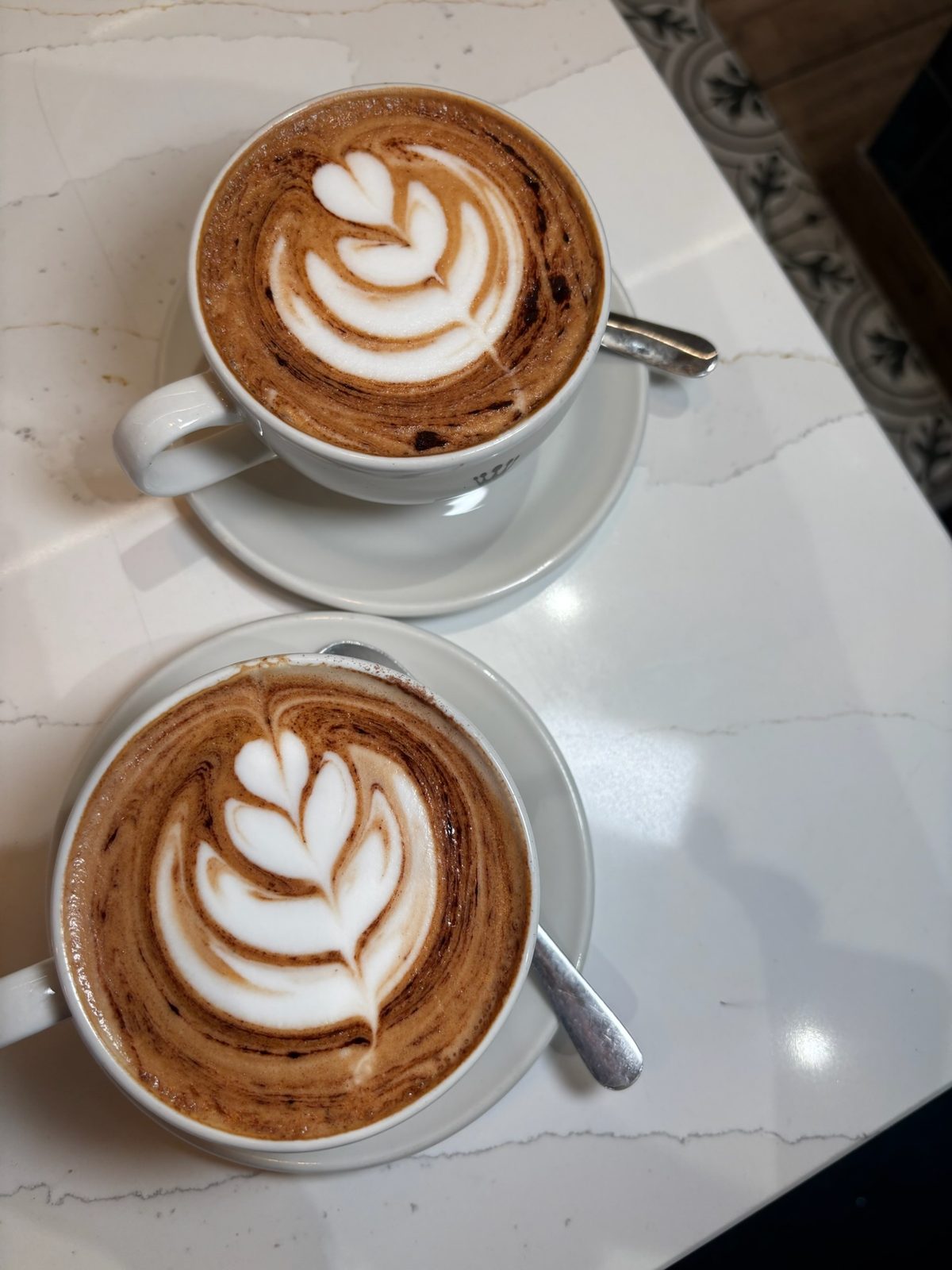Coffee latte art at Deli's Kitchen