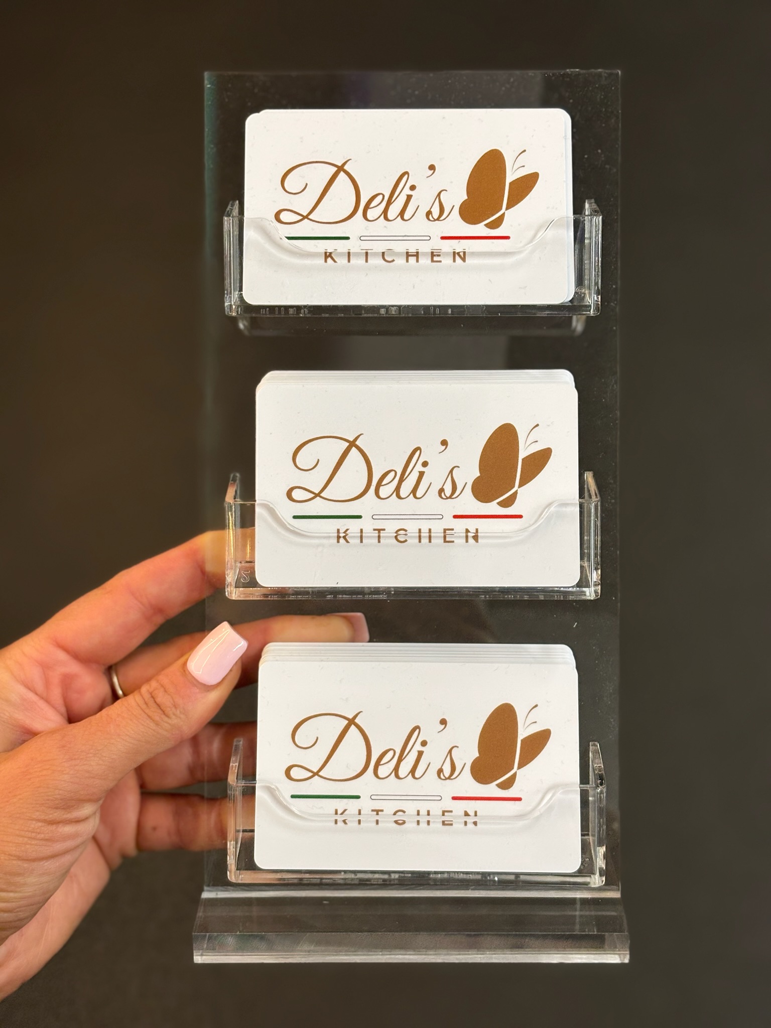 Deli's Kitchen branded gift vouchers on display