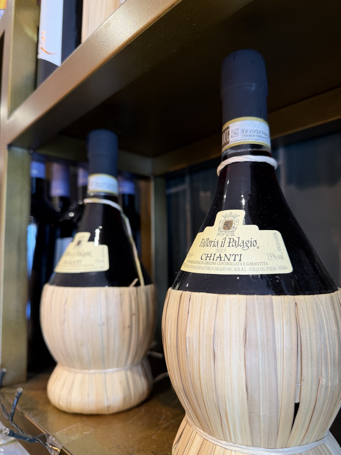 Straw-wrapped Chianti bottles at Deli's Kitchen